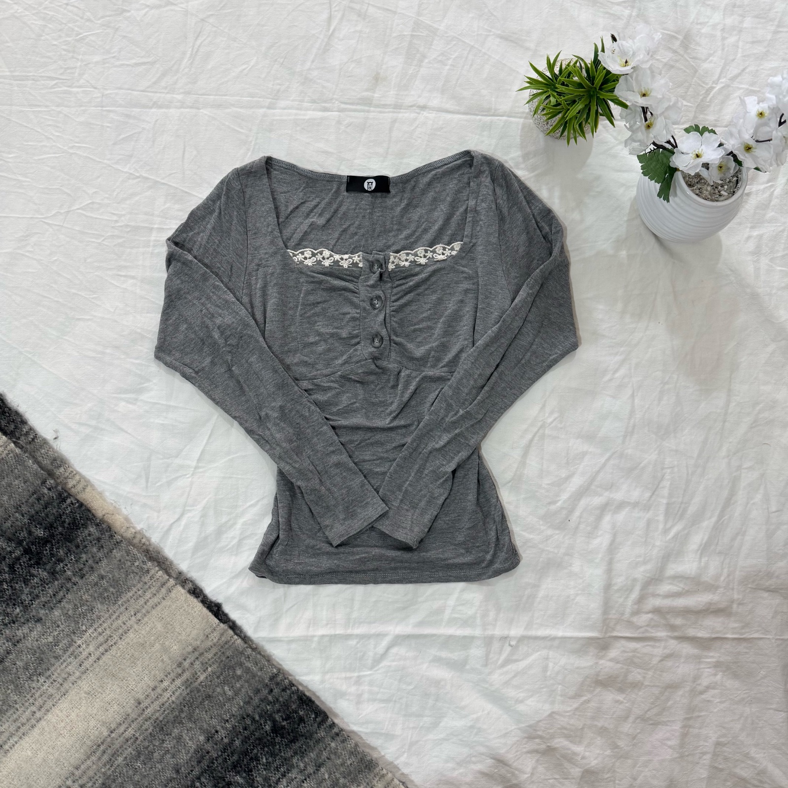 Top moulant gris