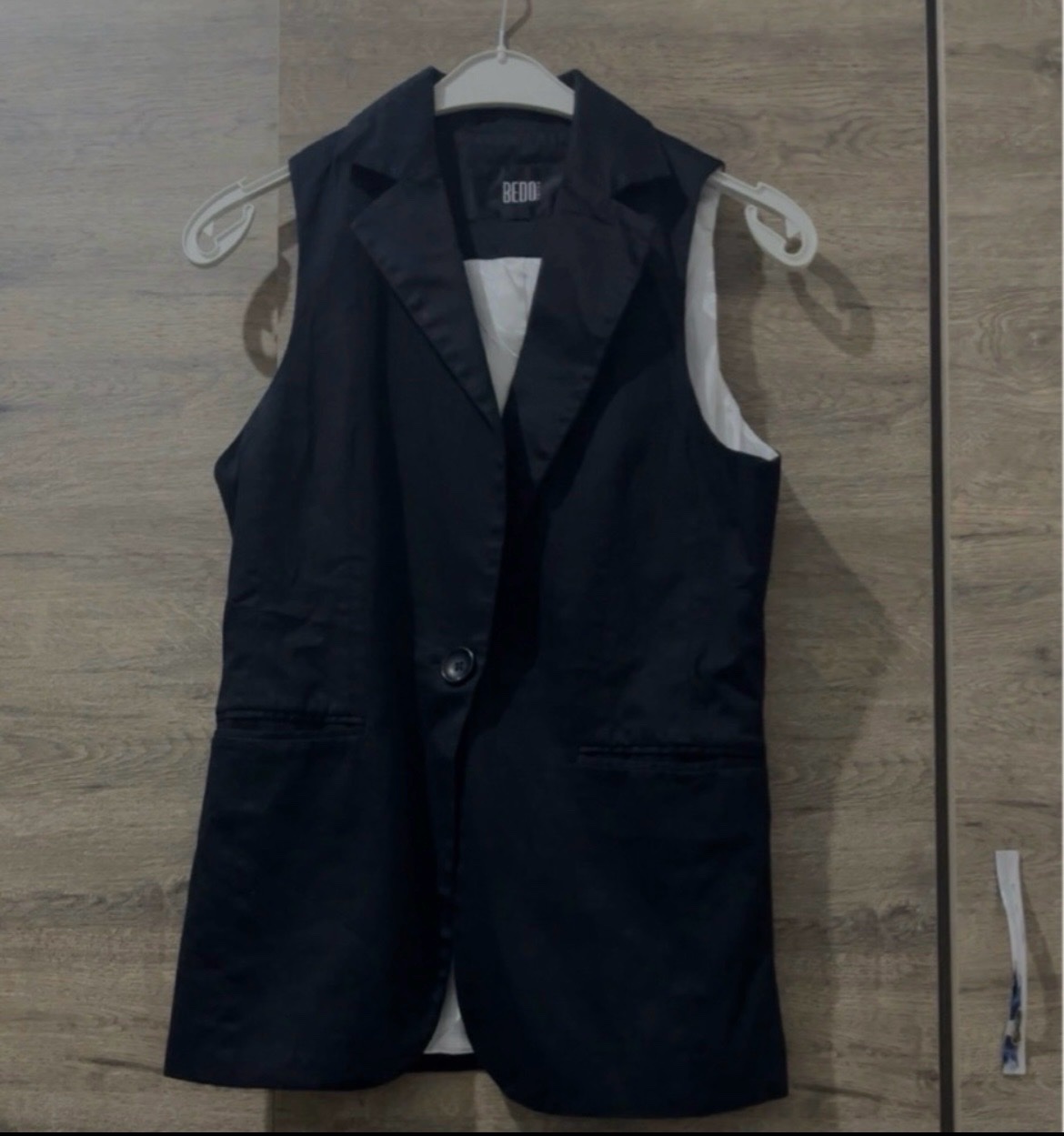 Veste sans manche etait neuf