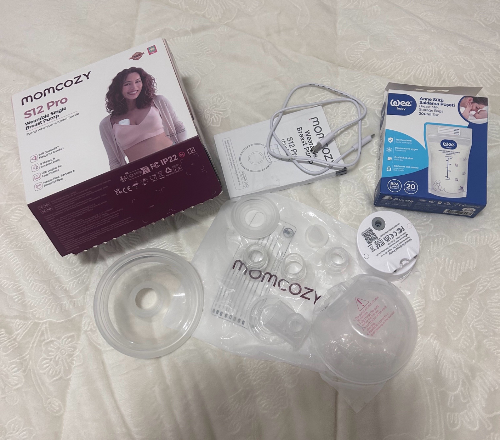 Tire lait mamocozy S12 Pro utilisées un peu presque neuf et sacs de congélation 