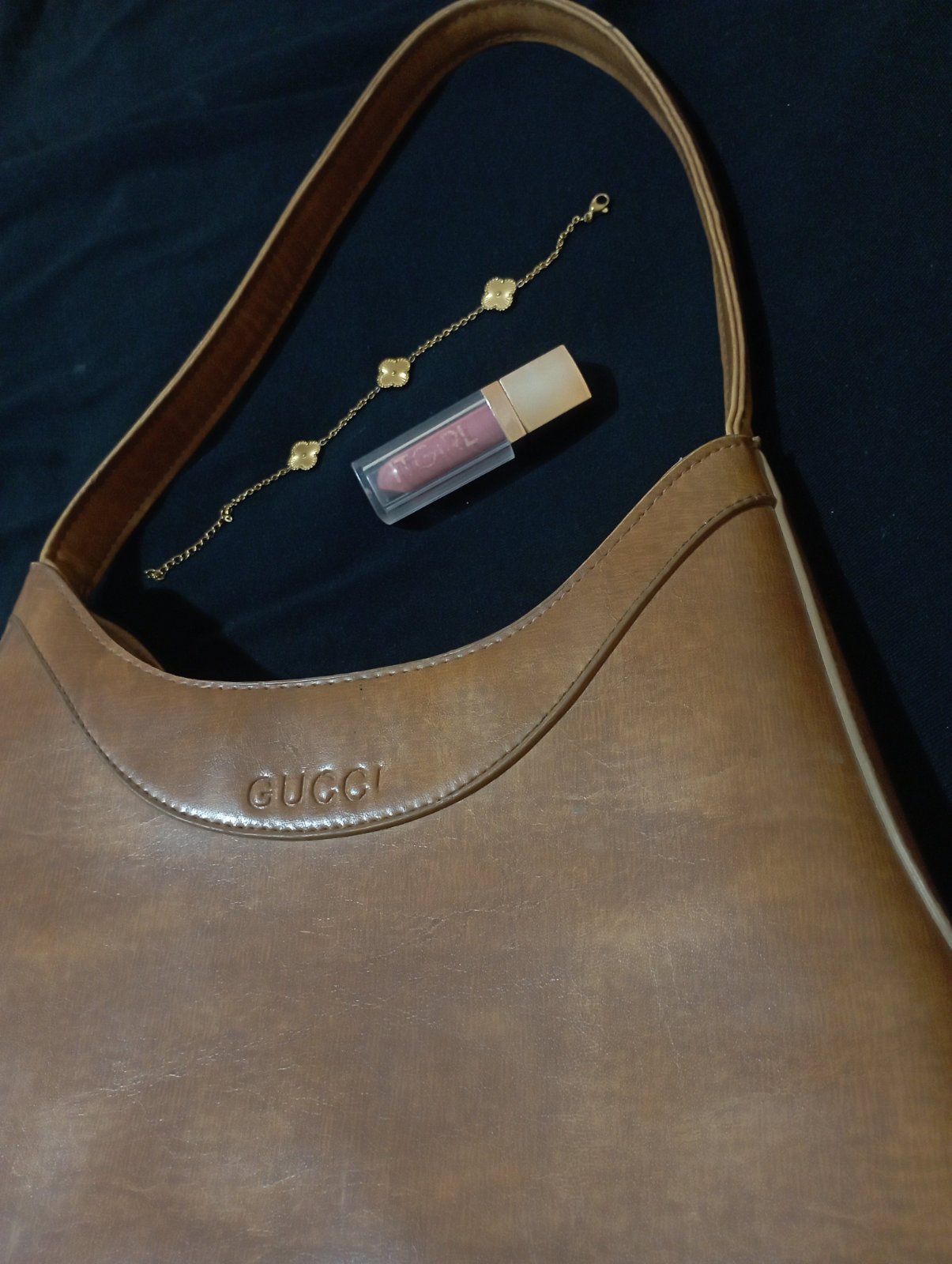 Un joli sac à main de couleur marron clair 