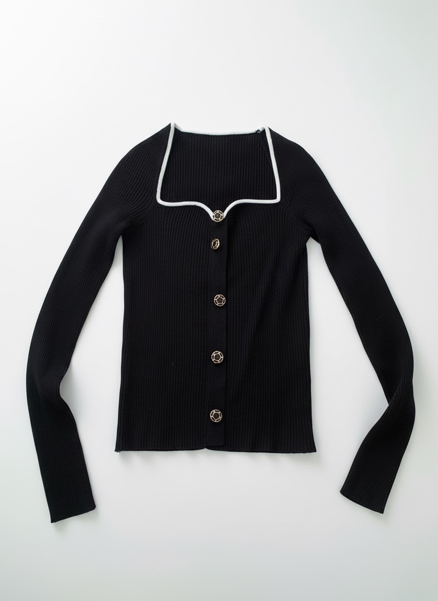 Pull noir en maille côtelée