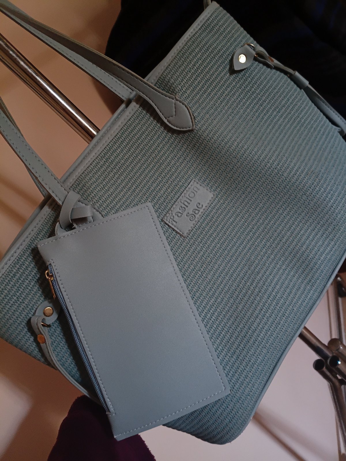 Un sac bleu ciel avec un trouse