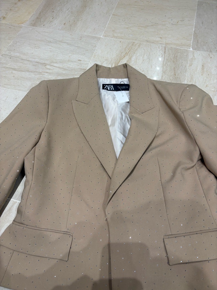 Veste festive beige aves strass