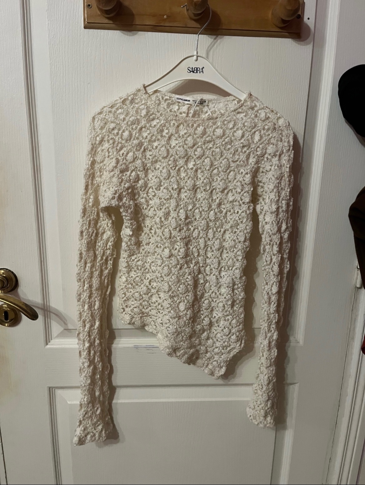 Pull en dentelle blanc cassé taille S et petite M