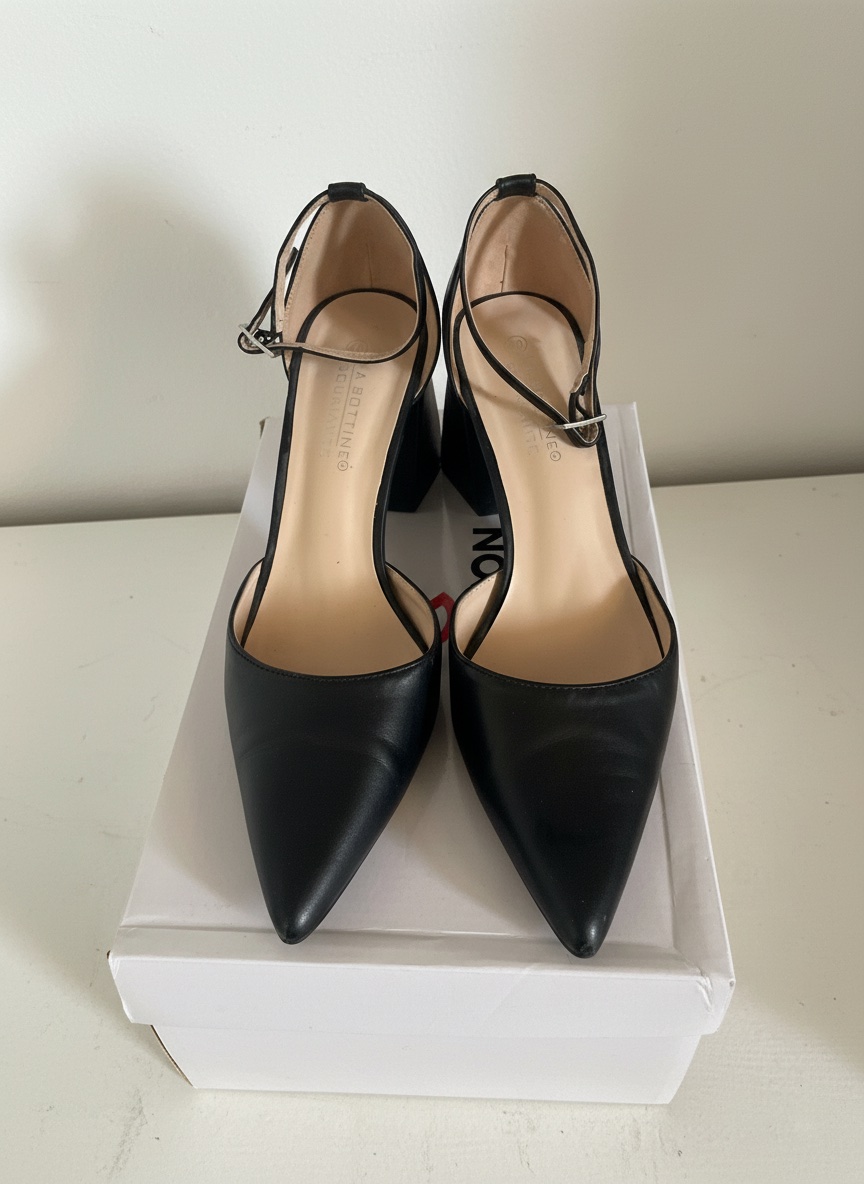 Escarpin noir porté une fois 