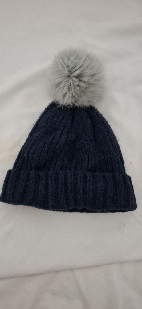 Un bonnet à pompon