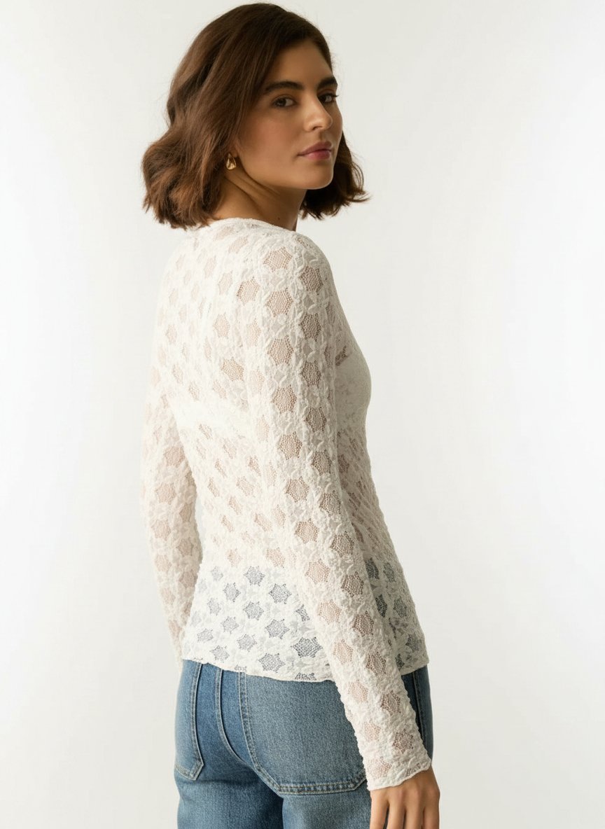 Haut en dentelle blanche