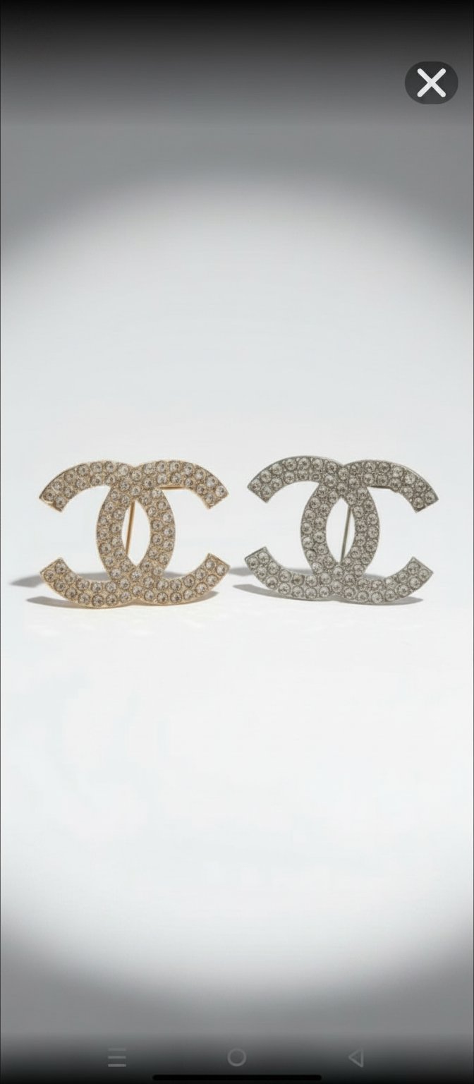 Broche doré et argent