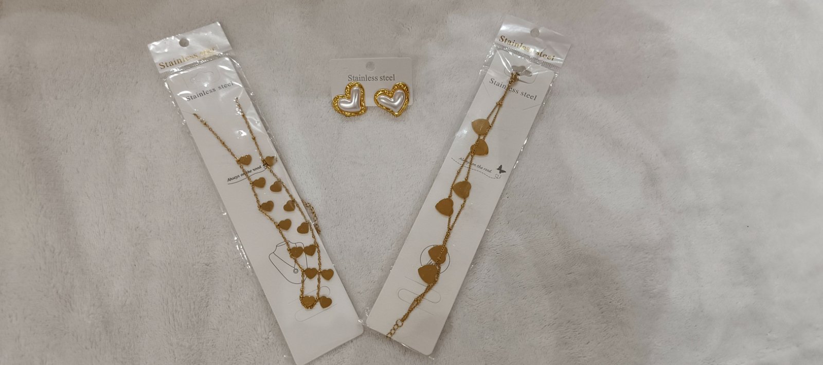 Bracelet, collier et boucle d'oreille en acier inoxydable