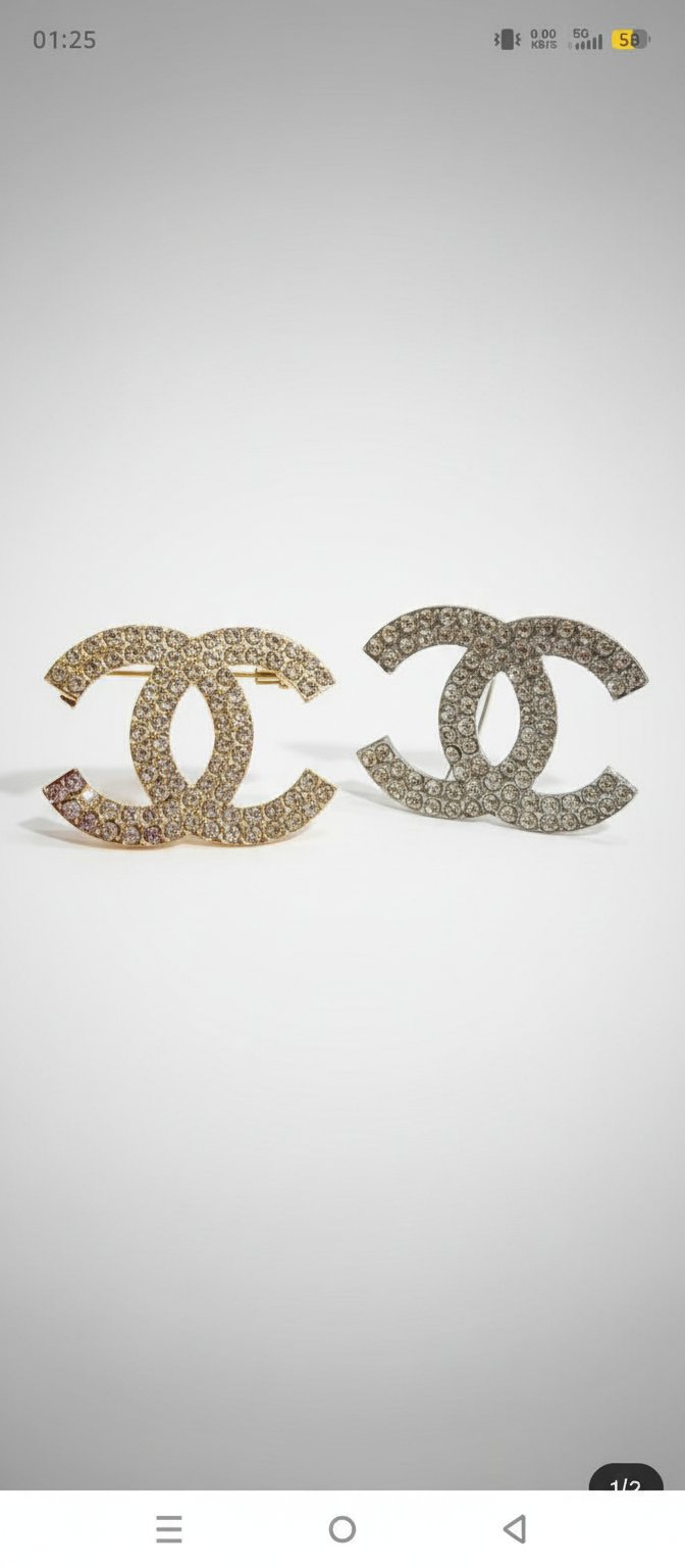 Broche doré et argent