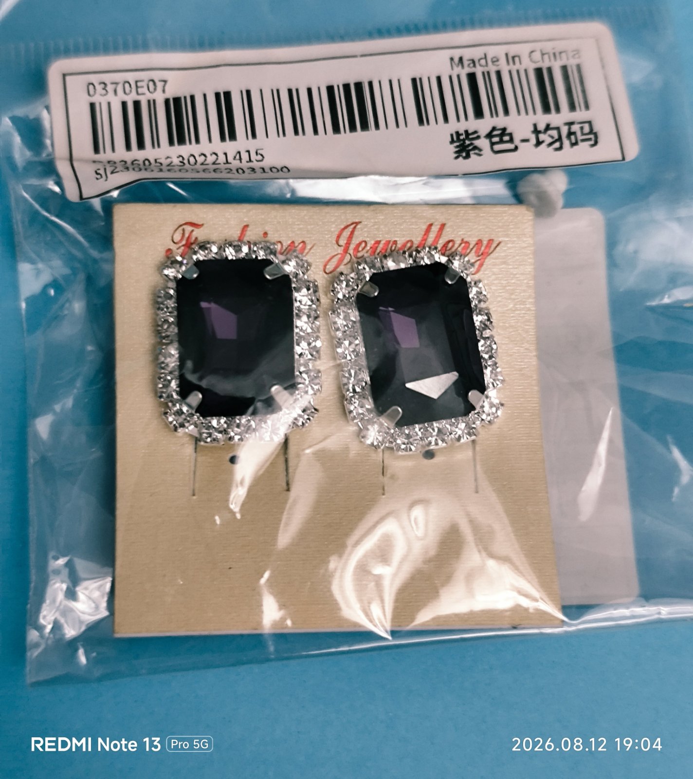 Boucles d' oreilles violet 
