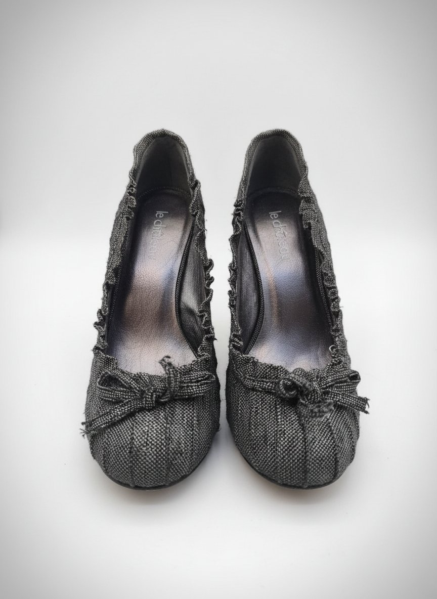 Escarpins à talons hauts de la marque Le Château en tissu tweed noir et blanc
