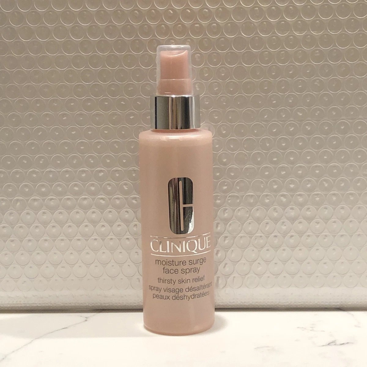Spray visage Clinique Moisture Surge Soulagement des peaux assoiffées 125 ml