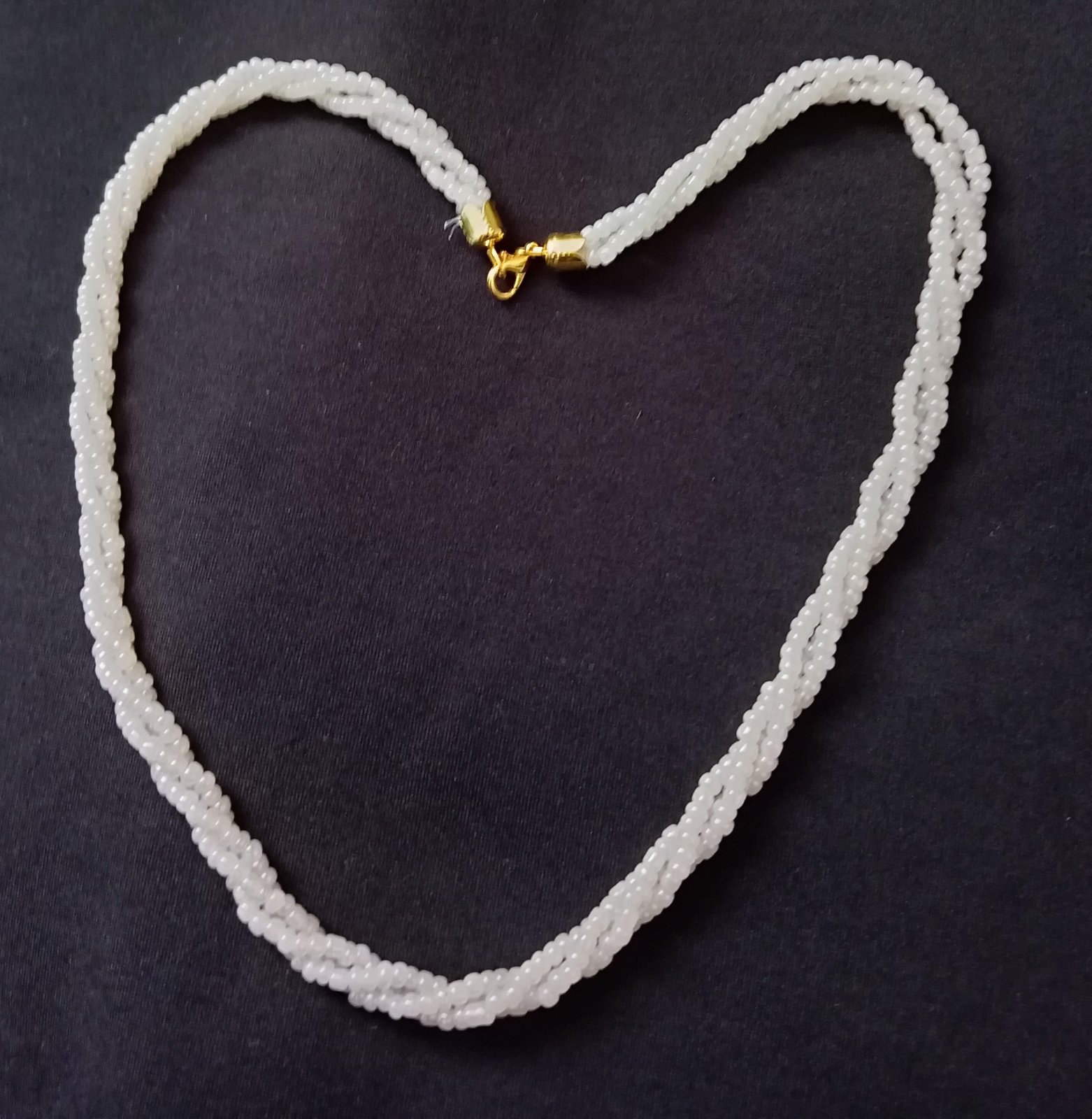 Collier avec perle tresse 