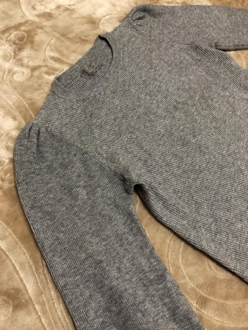 Pull gris manches bouffantes 