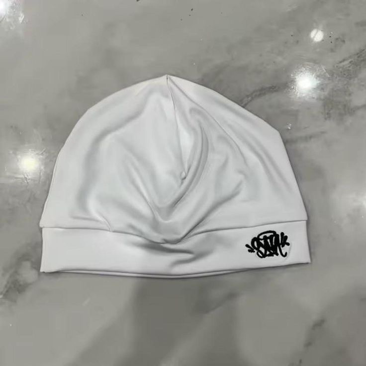 SYNA skull cap