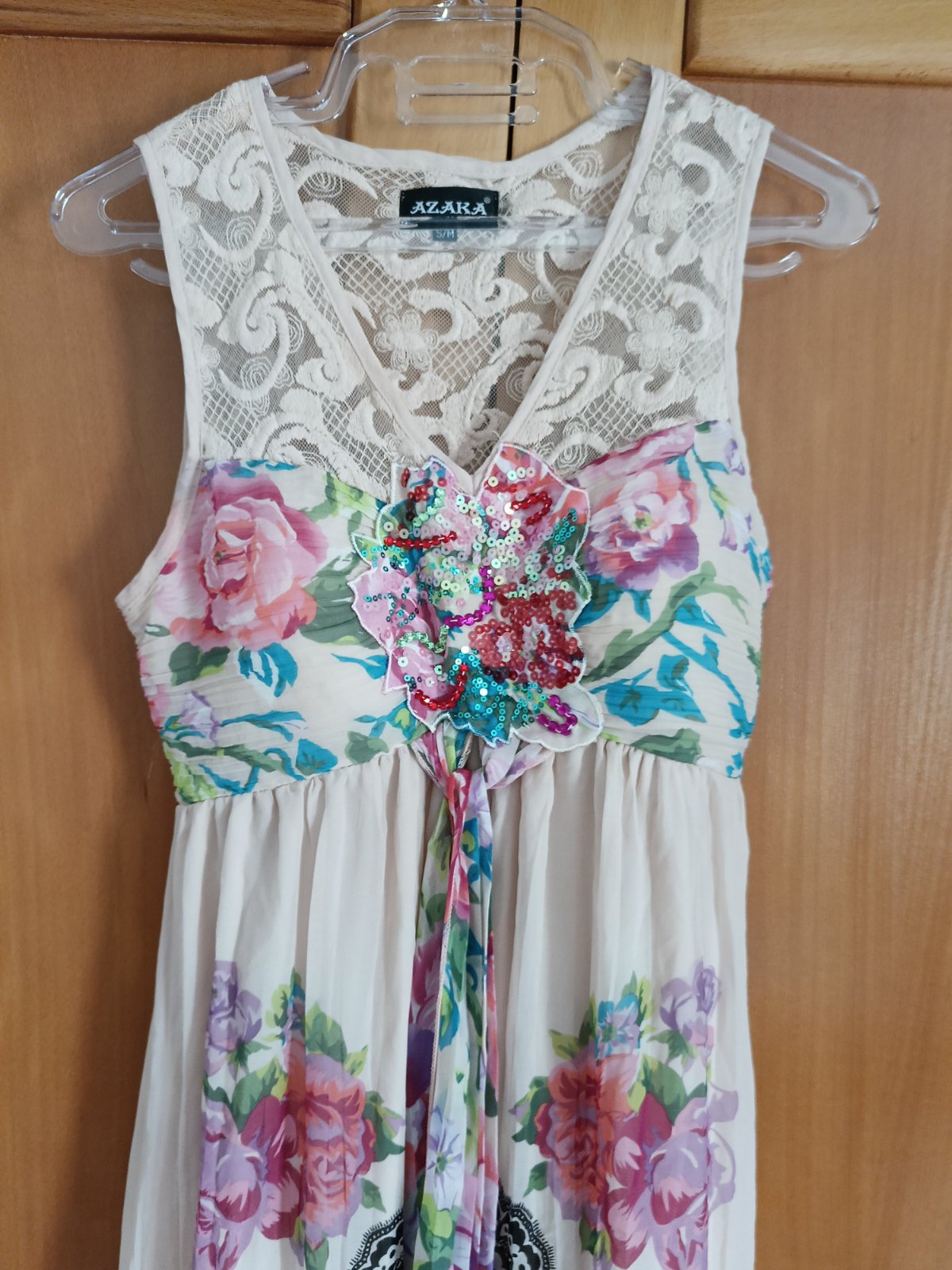 Tres belle robe beige rosé 