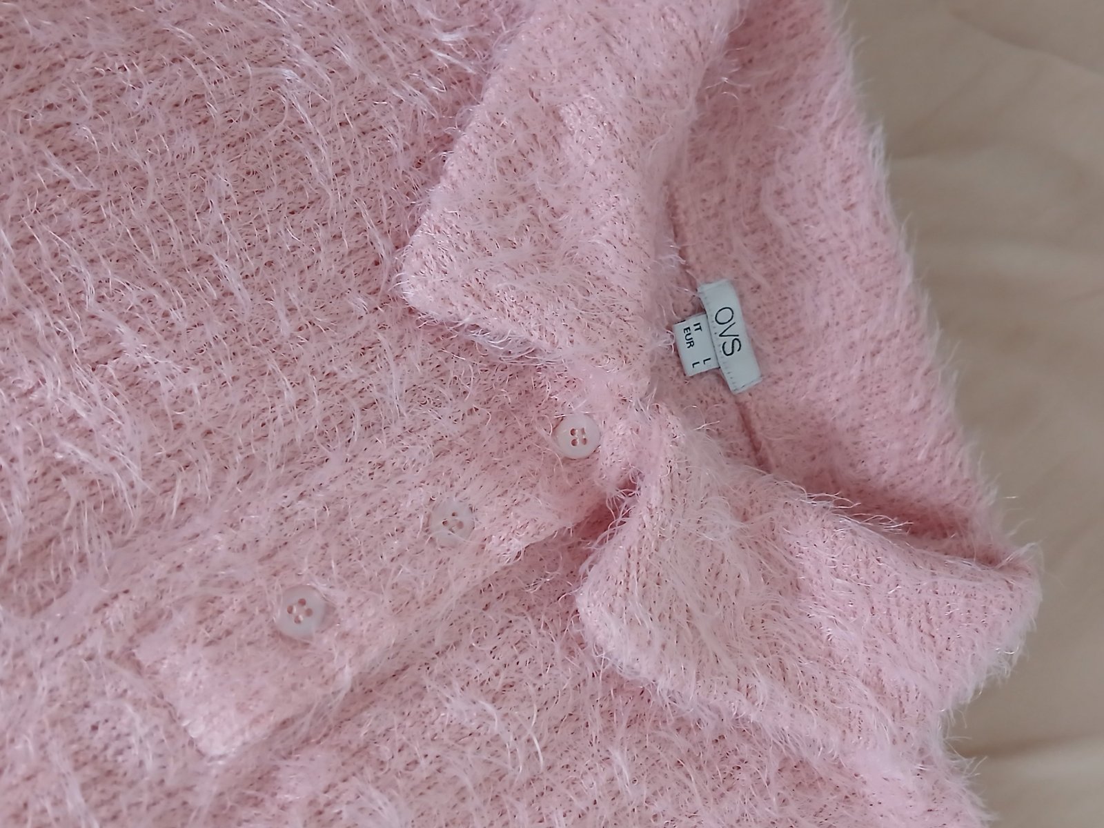 Pull rose doux et élégant
