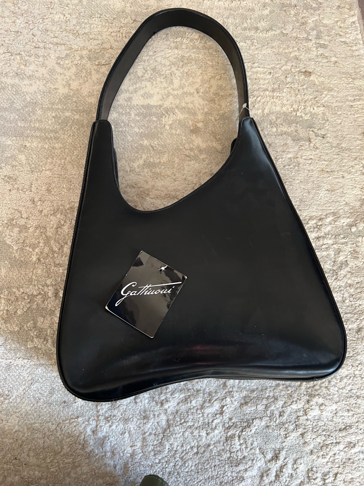 Sac en cuir de la marque gattinoni jamais porté avec son ticket
