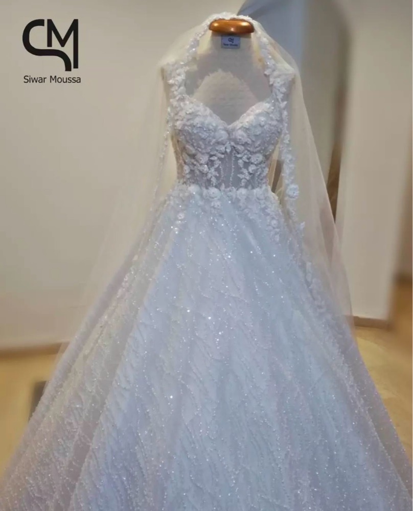Robe de mariée faite sur mesure