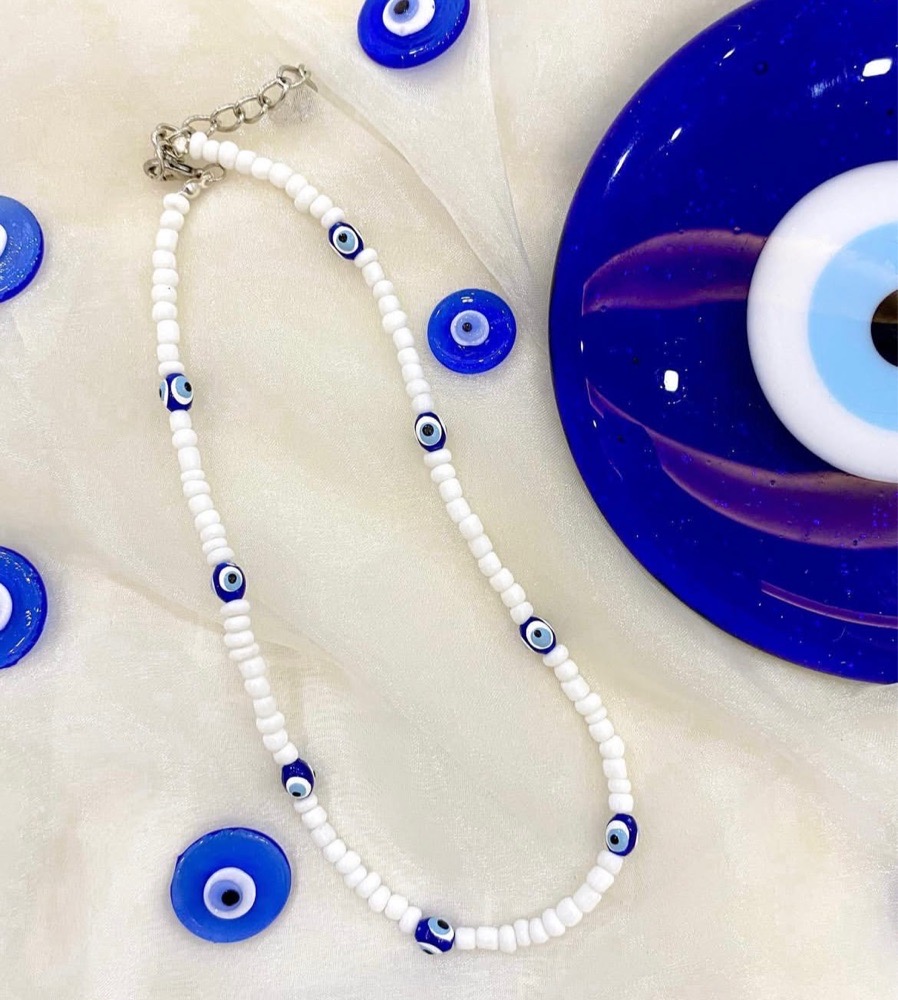 Collier blanc avec 🧿