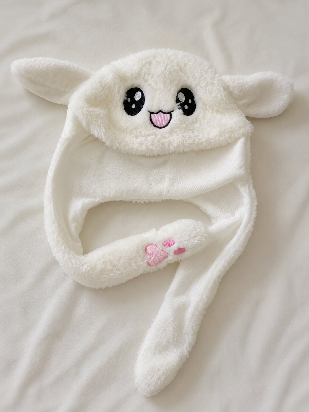 Bonnet lapin blanc à oreilles animées