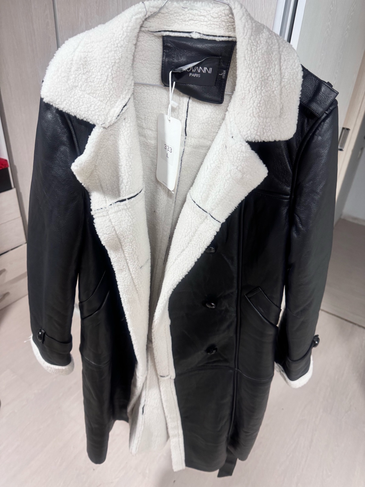 Manteau noir effet cuir avec doublure sherpa