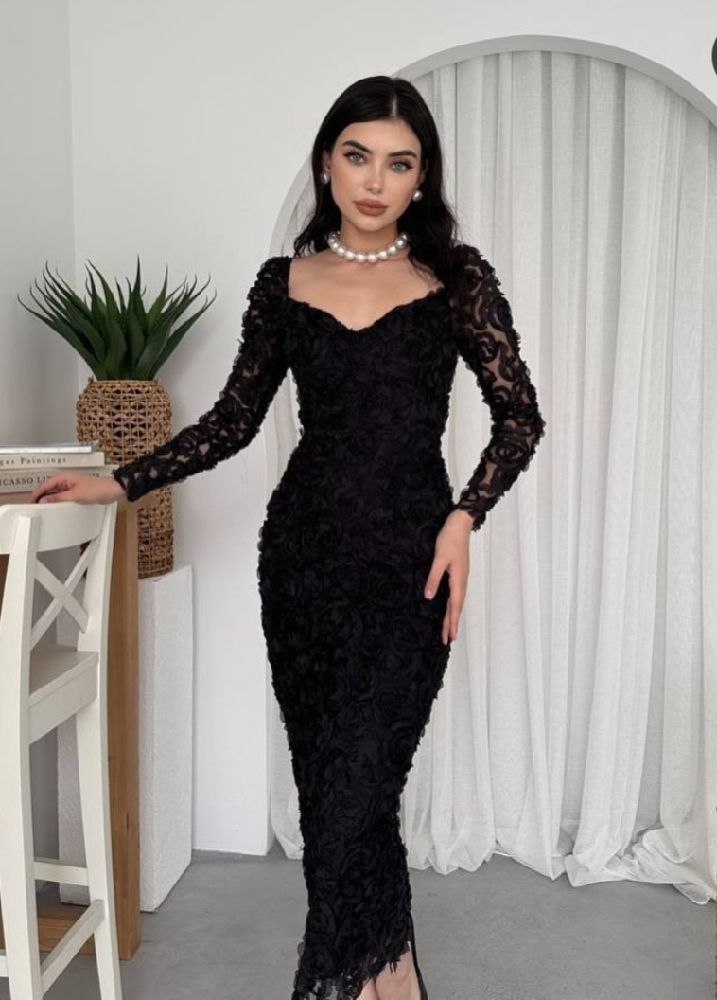 Robe noir soirée très chic décolleté 