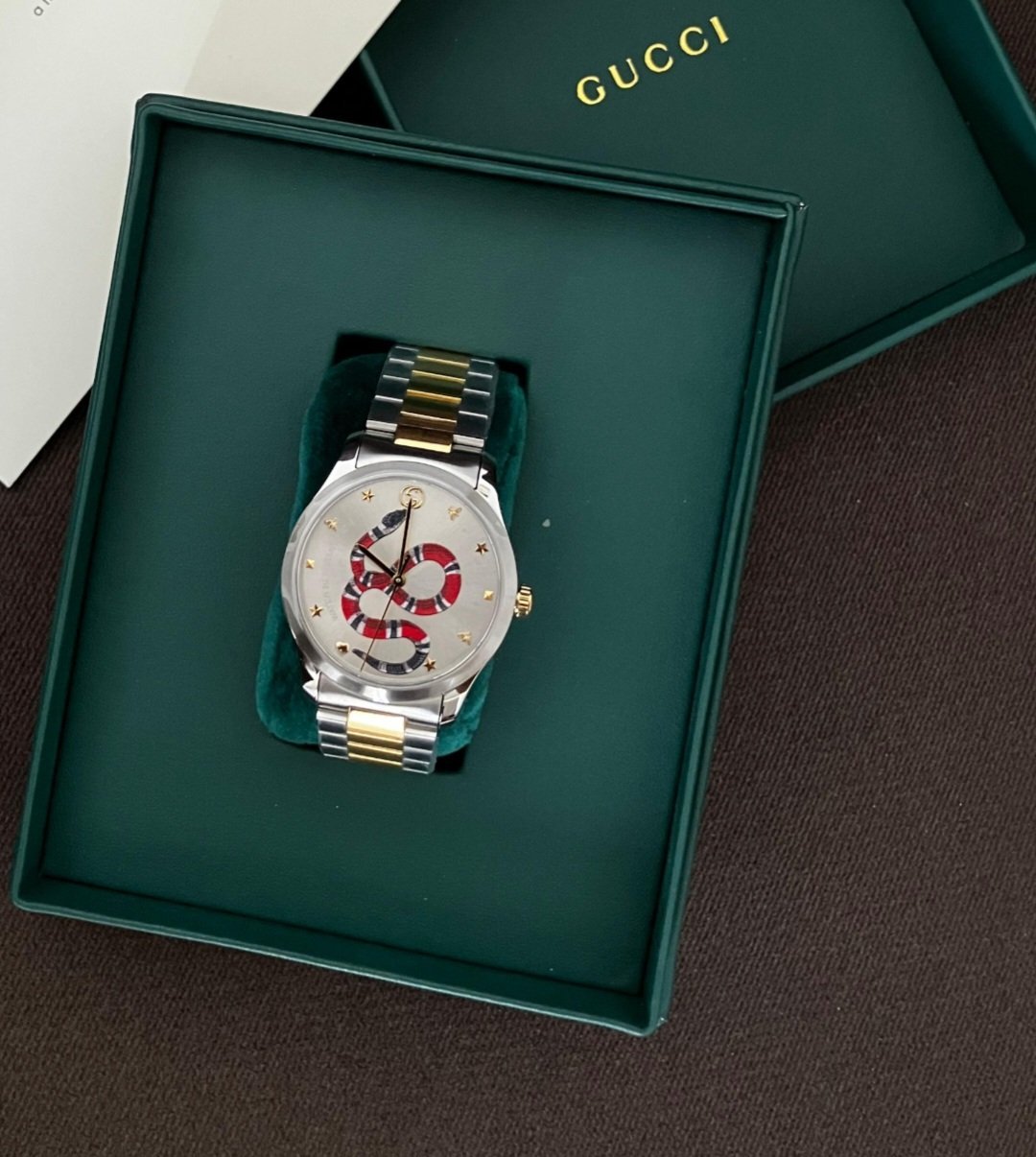 Gucci  Gucci Unisex's G-Timeless Silver Dial Watch