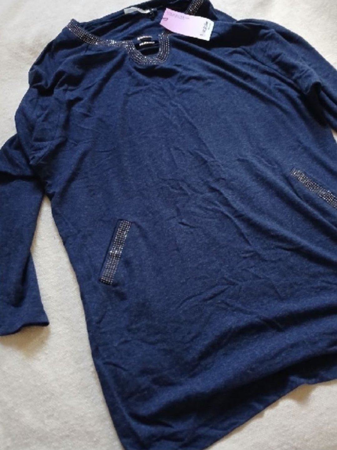 Pull avec étiquette 