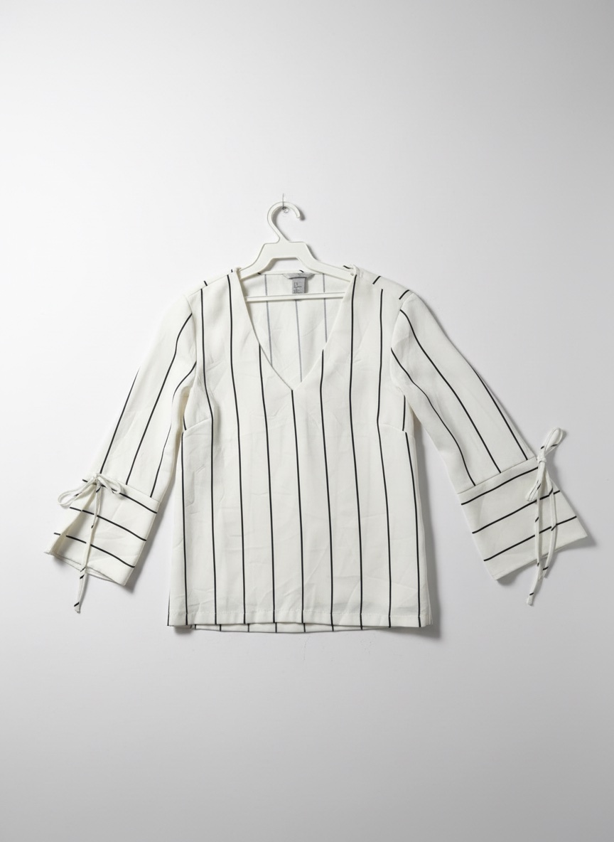 Chemise noir et blanc de la marque H&M