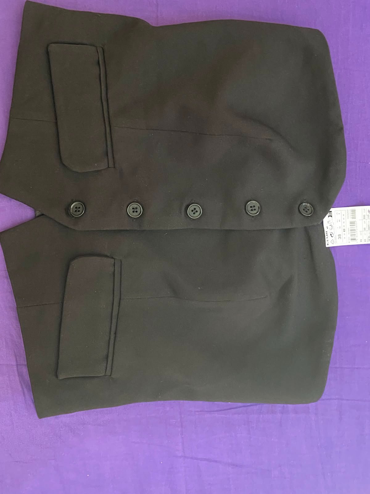 - Gilet de costume sans manches