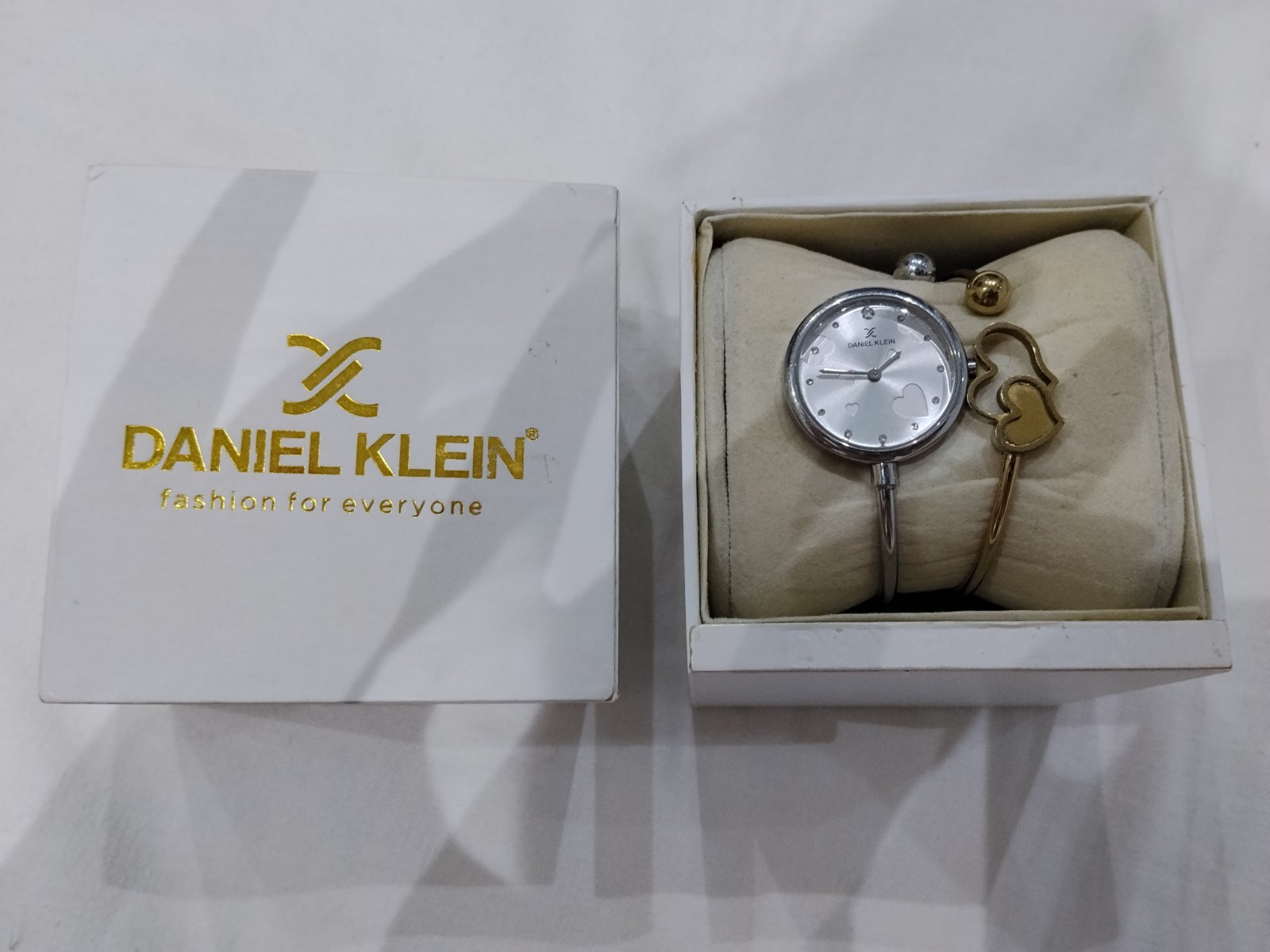 Montre argent avec bracelet doré Daniel Klein 