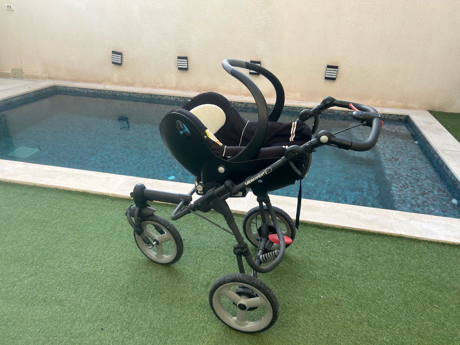 Poussette siège-auto pliable