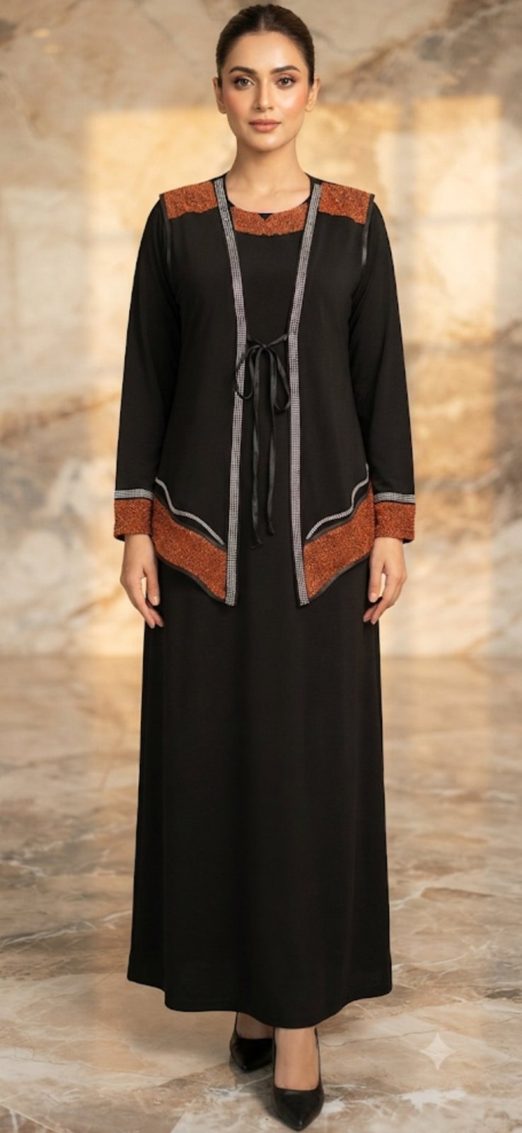 Magnifique ensemble de type abaya marque Mille Miels  se compose d'une longue robe noir et d'un gilet assorti ornée détails cuivré et argenté étincelant  convient 38/40