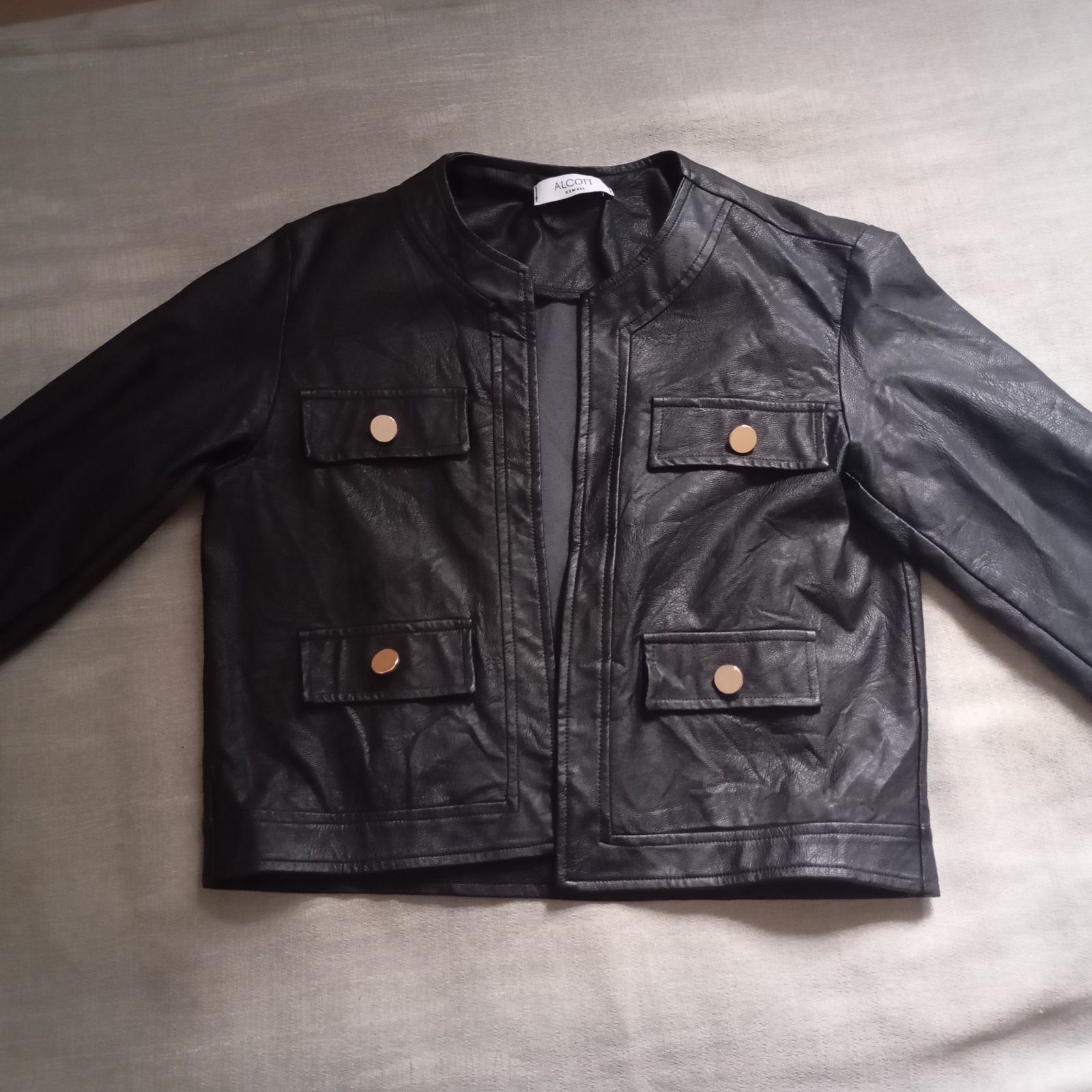 Veste cuir très jolie