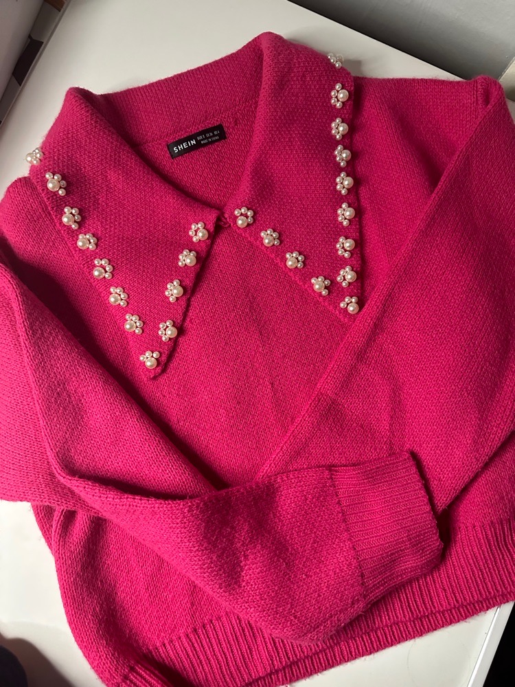 Pull rose avec strass