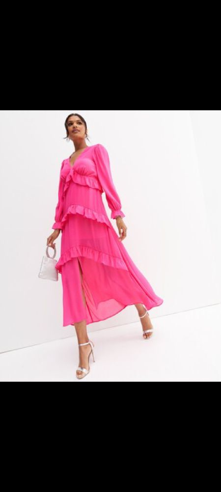 Robe longue rose toute neuve 
