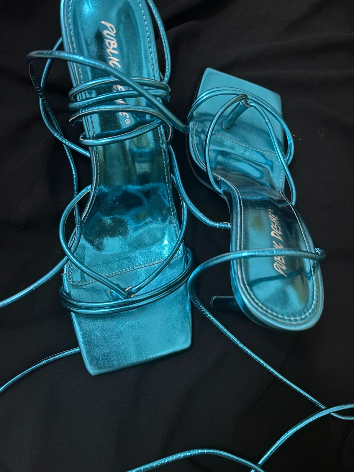 These are Public Desire Holly strappy stiletto heels in a metallic blue colorway