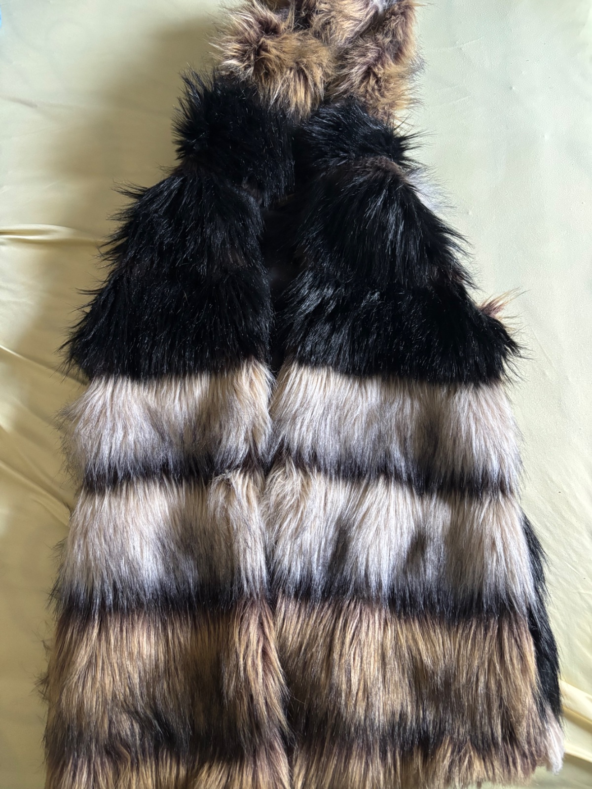 A made in italy multi-tone faux fur vest 