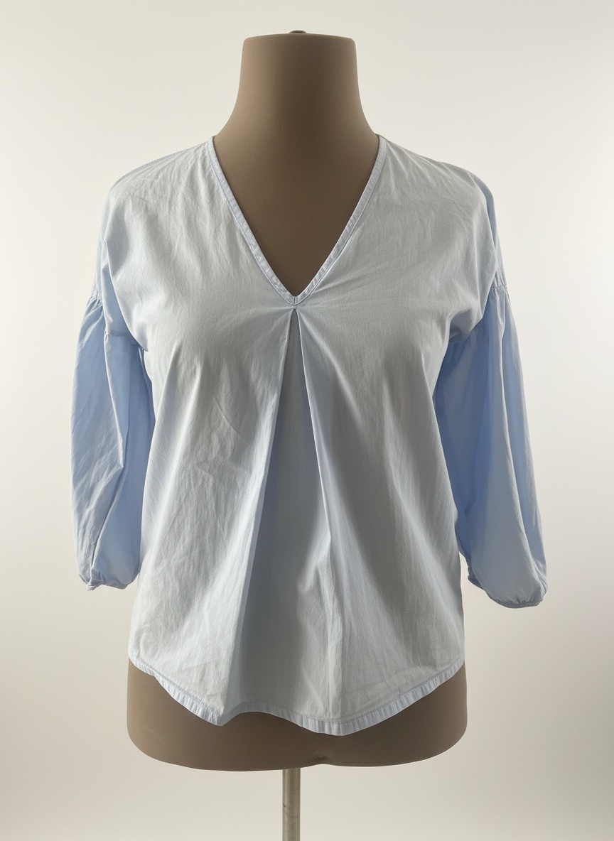 Blouse bleu ciel yesser hlowa khfifa sayeffi manche 3/4 boufante