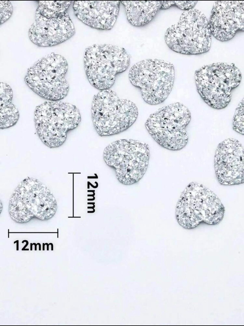 200 piéces motif cœur crystale en plastic collant avec tube cole