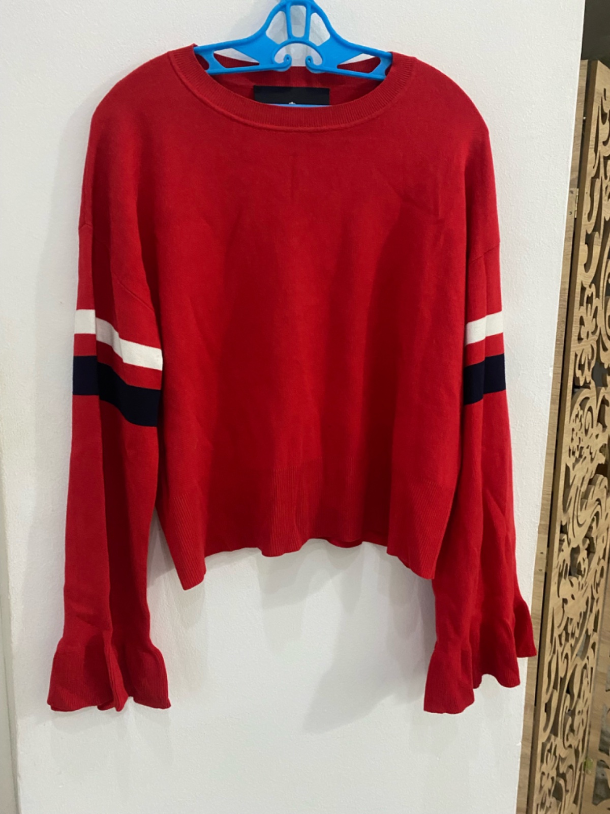 Pull rouge vive
