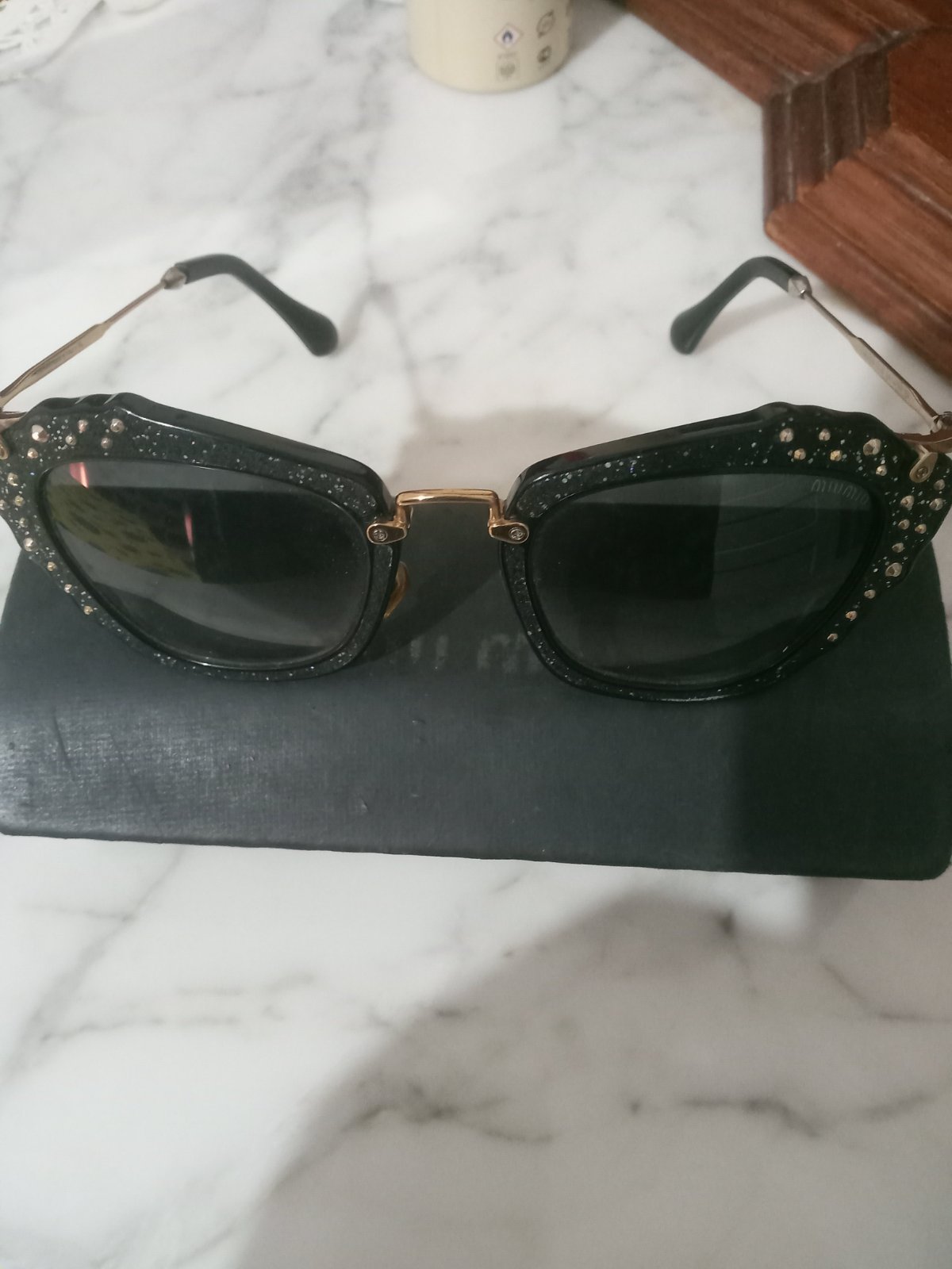 Lunettes solaires miu miu