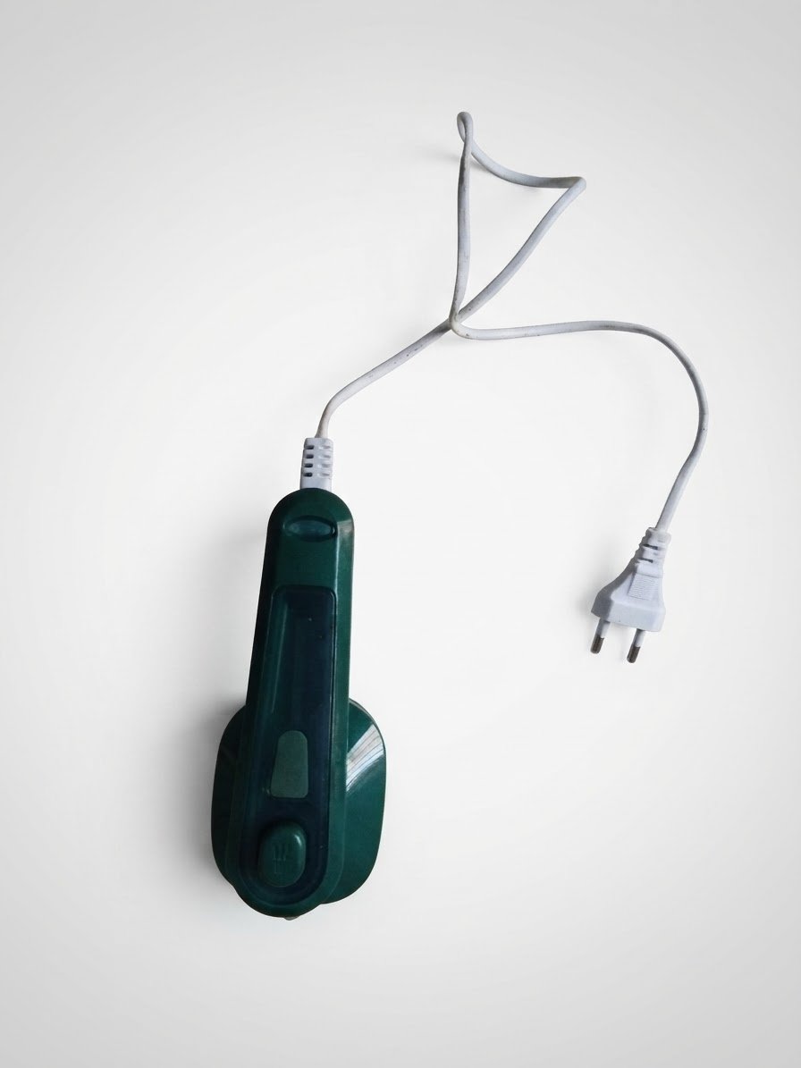 Dry iron with spray