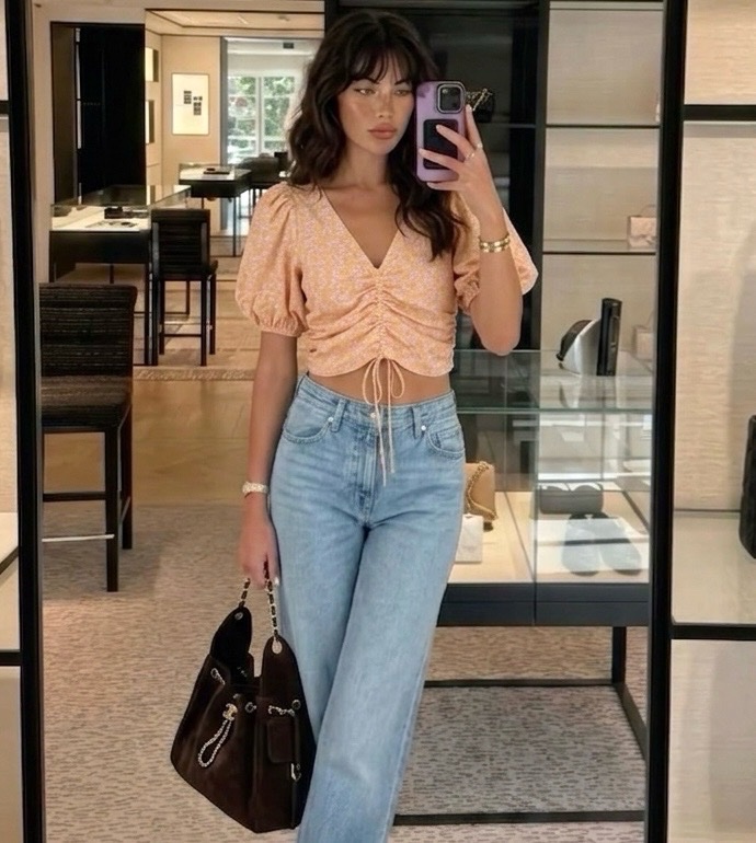 Pull fleurie orange