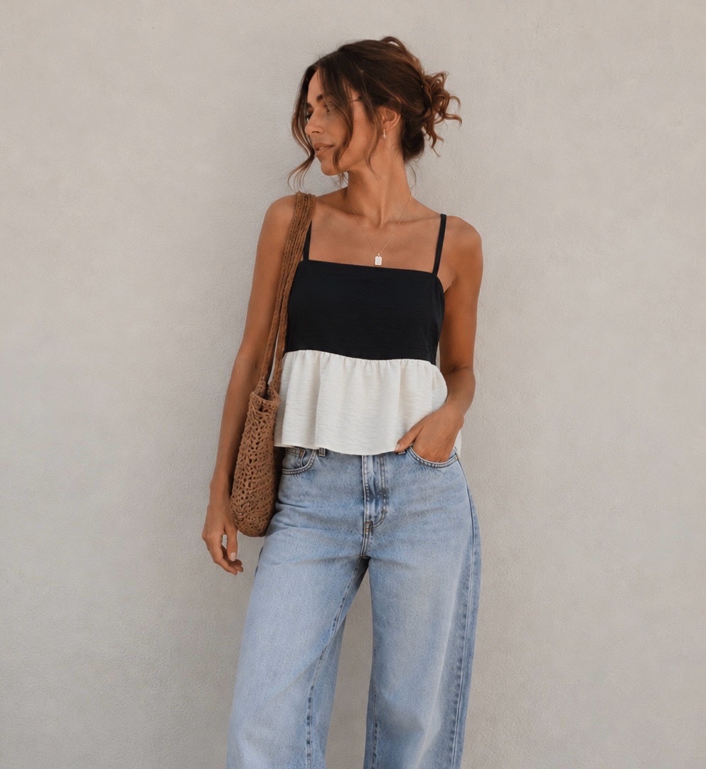 Pull noir et beige