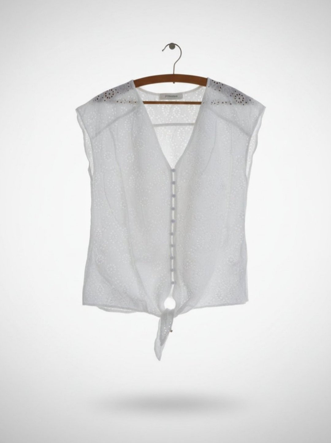 Jolie chemise sans manches broderie anglaise taille M