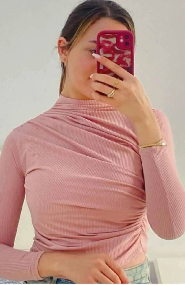 Pull drapé rose