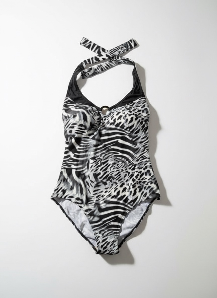 Maillot de bain une pièce présente un motif zèbre noir et blanc distinctif avec une encolure dos nu taille 46/48